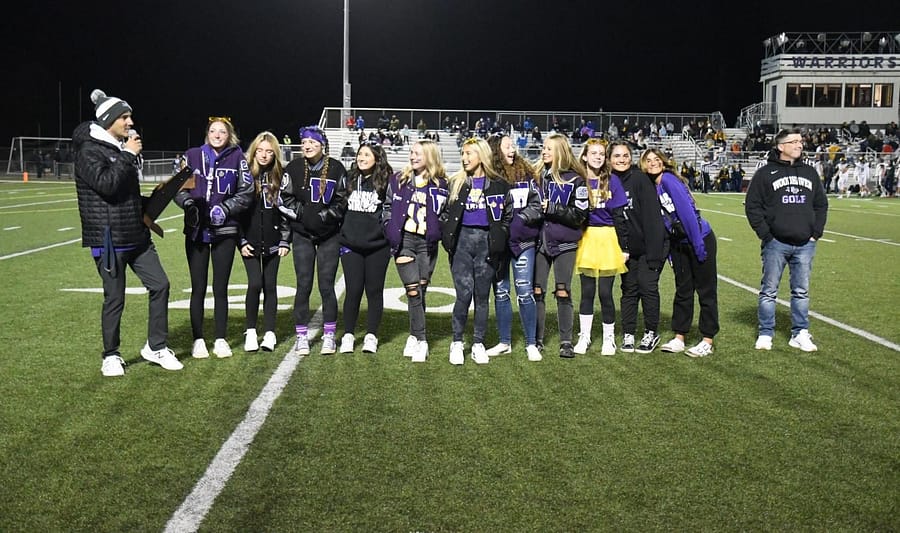 The 2022 Girls Golf Team is recognized before the homecoming crowd for their first ever regional championship. 